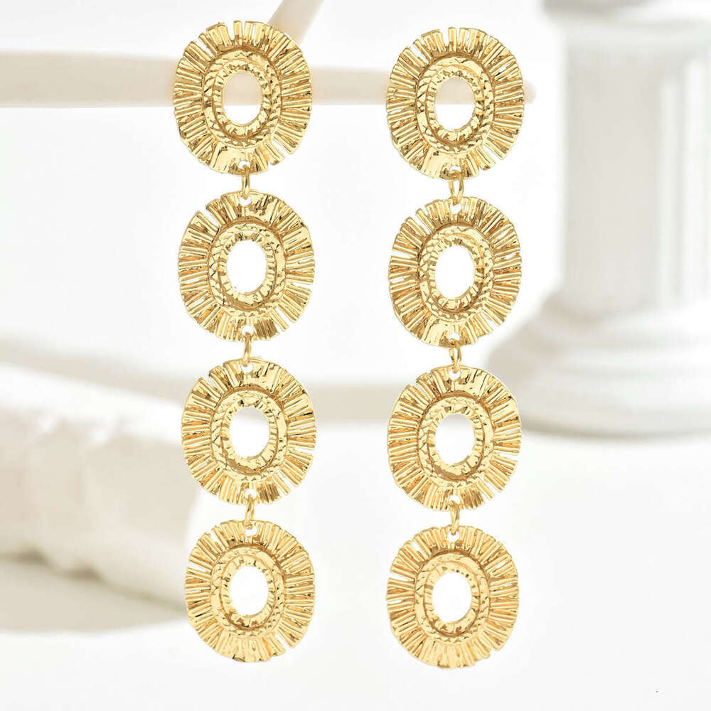 Exaggerated Metal Personality Round Pendant Hollow Niche High-end Sense Women's Stud Earrings