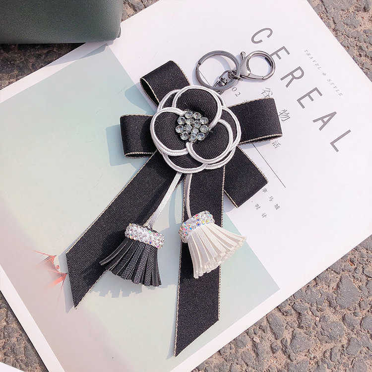Korean style bow camellia tassel keychain diamond-encrusted bag pendant car key ring car decoration Z250816