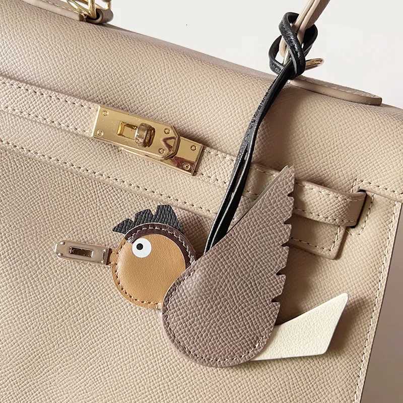 TOPHIGH Flying Bird Pendant For Wen Bag Cowhide Leather New Cartoon Designer Luxury Bags Keychain Newly Car hanging Charms S250816