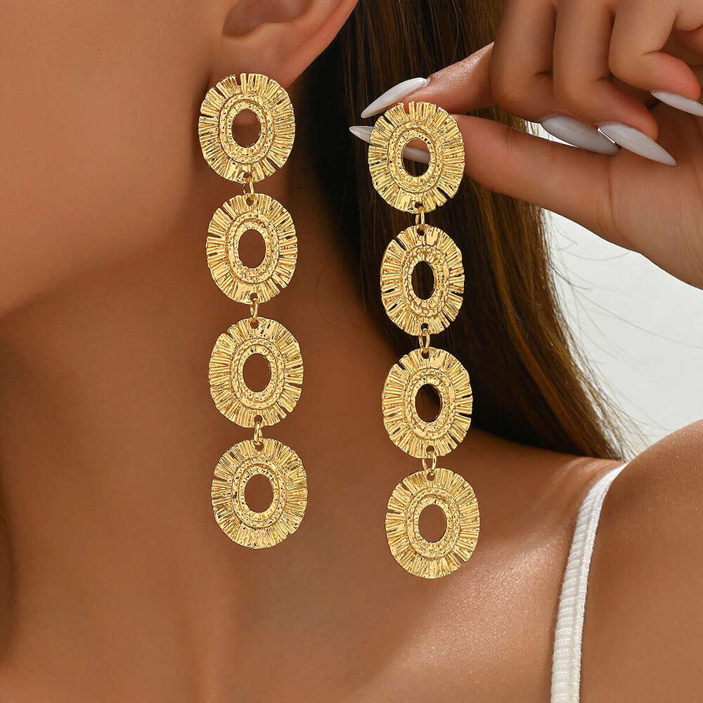 Exaggerated Metal Personality Round Pendant Hollow Niche High-end Sense Women's Stud Earrings