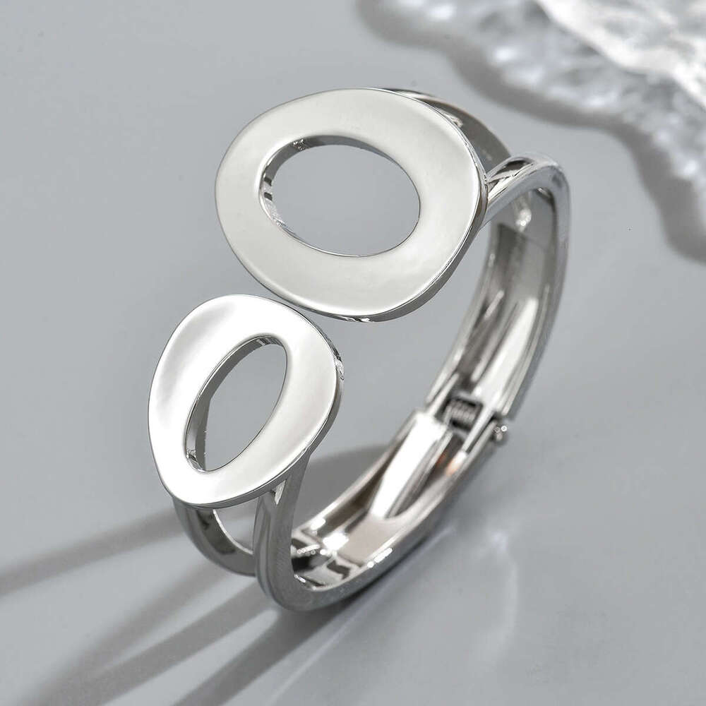 Feng Women's Geometric Niche Hollow Metal Smooth Design Asymmetric Open Bracelet Jewelry