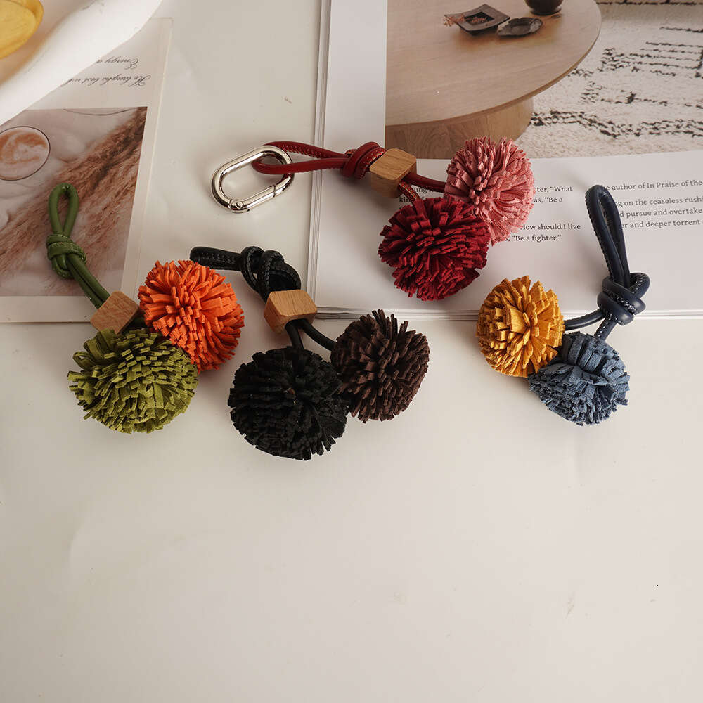 Bag charms designer luxury charm Two small balls Accessories High-End Mini Leather Handmade womenTassel Ball Keychain Bag Pendant