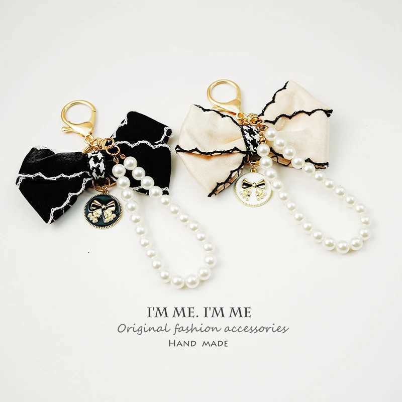 Elegant Luxury lia Flower Bowknot Purse Fur Ball Pearl Keychain For Girl Wen Key Chains Ring Car Bag Pendent Charm D378 S250816