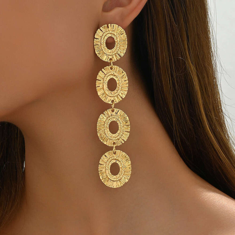 Exaggerated Metal Personality Round Pendant Hollow Niche High-end Sense Women's Stud Earrings