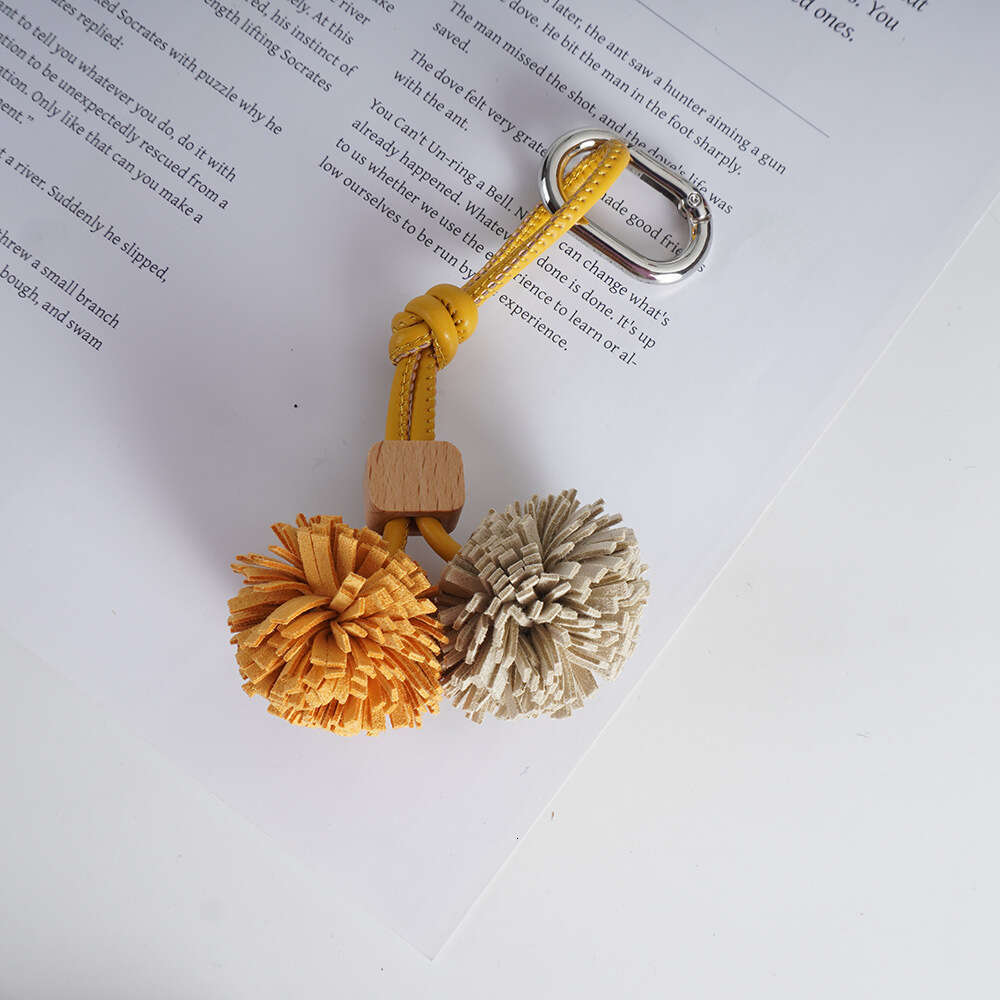 Bag charms designer luxury charm Two small balls Accessories High-End Mini Leather Handmade womenTassel Ball Keychain Bag Pendant