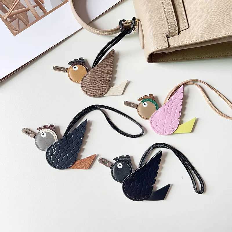 TOPHIGH Flying Bird Pendant For Wen Bag Cowhide Leather New Cartoon Designer Luxury Bags Keychain Newly Car hanging Charms S250816