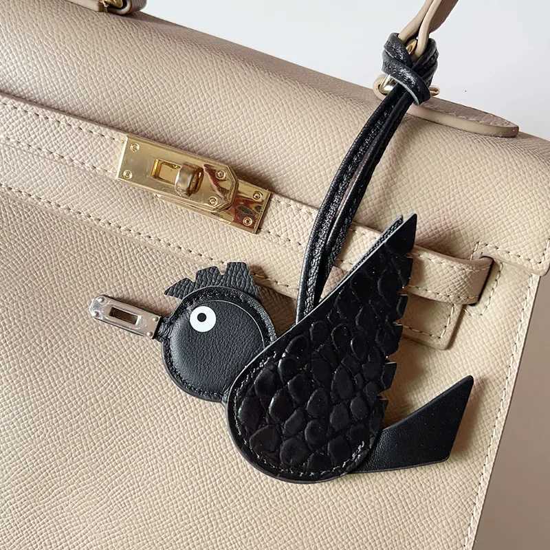 TOPHIGH Flying Bird Pendant For Wen Bag Cowhide Leather New Cartoon Designer Luxury Bags Keychain Newly Car hanging Charms S250816