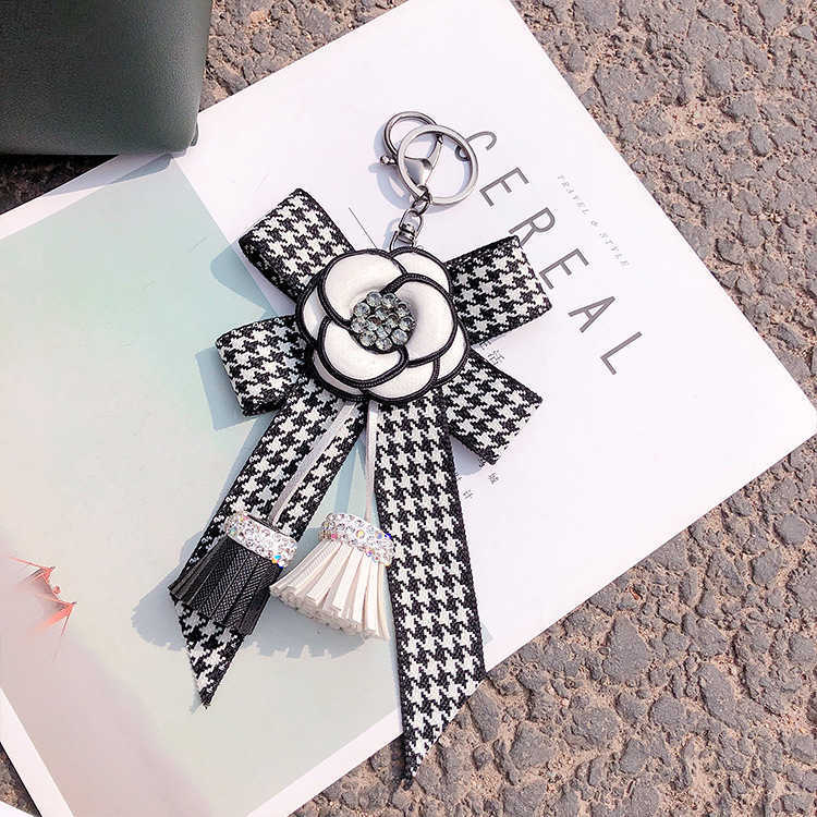 Korean style bow camellia tassel keychain diamond-encrusted bag pendant car key ring car decoration Z250816