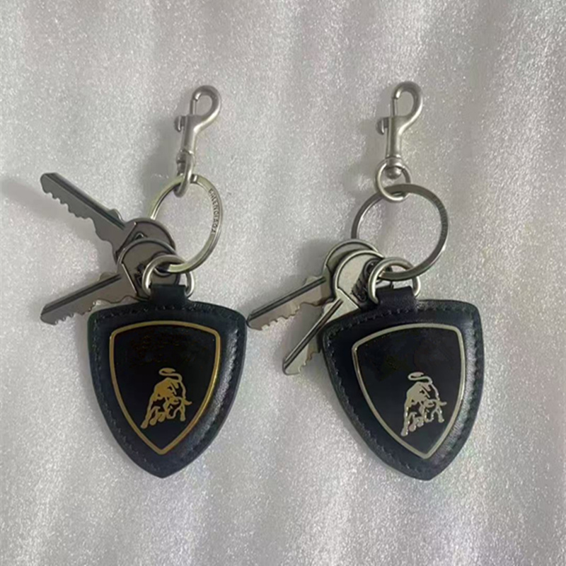 25SS high-quality black shield cowhide keychain shoulder bag pendant fashionable accessories