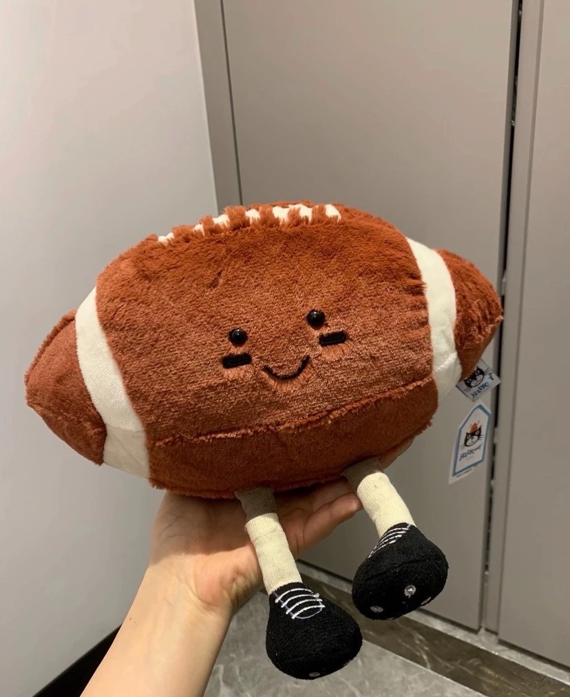 Dolls Jelly cat Amuseables Sports Football 1 Plush Children's plush toys American football Soft Toy rugby body pillow Soothing the Doll GiftsJelly Catv