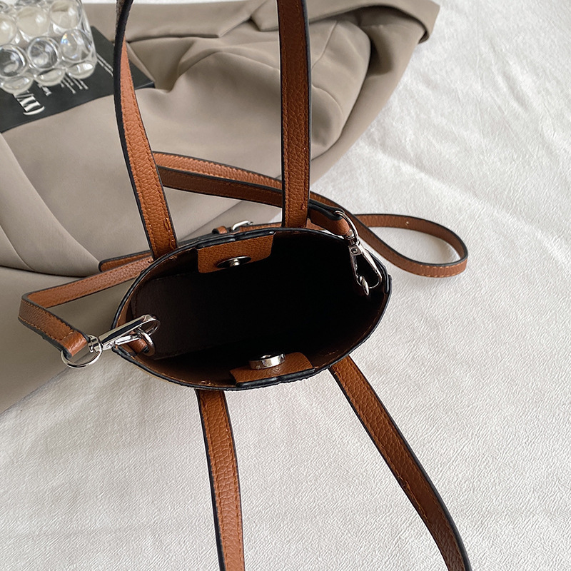 Free Shipping Designer Fashion Contrasting Women's Mini Handbag New High-end Temperament Single Shoulder Crossbody Bag Niche Bucket Bag Casual Ph