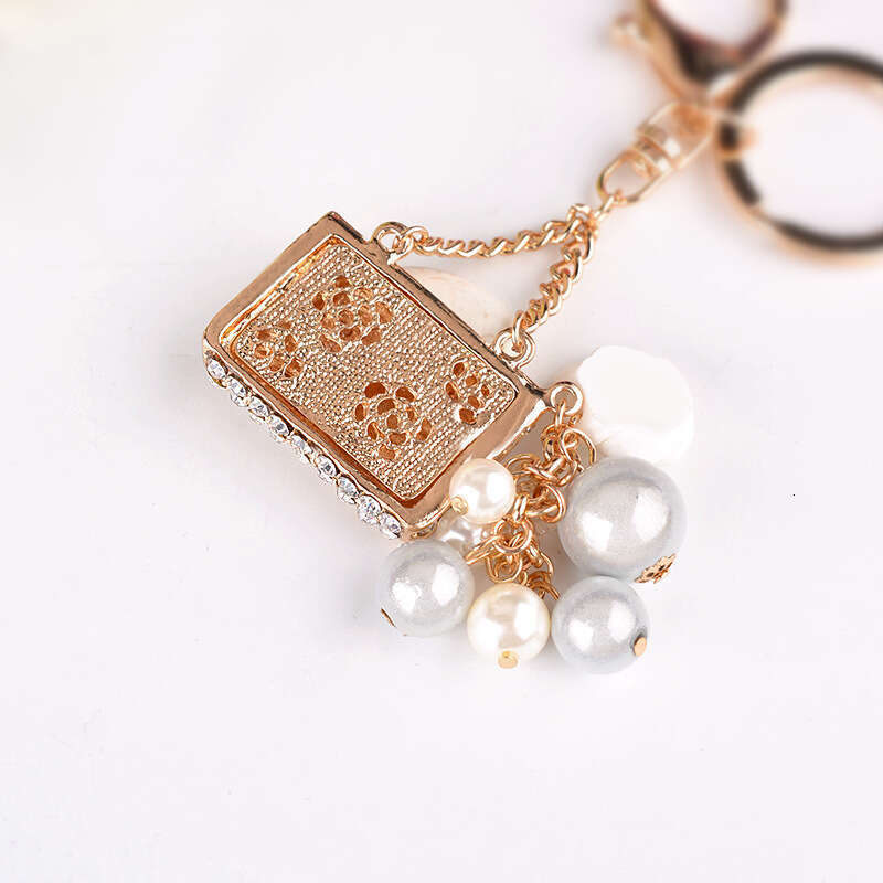 Korean Version Creative Fashion Pearl Bag Alloy Rhinestone Keychain Exquisite Car Hanging Ornament Small Gift