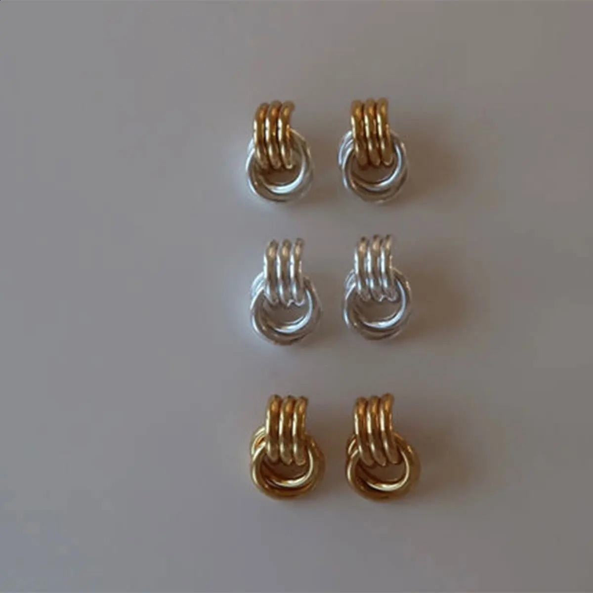 Uworld Individualistic Stainless Steel Baby Knot Gold Stud Earrings Texture Anti Allergic Statement Jewelry 2024 Everyday Rotati 250811