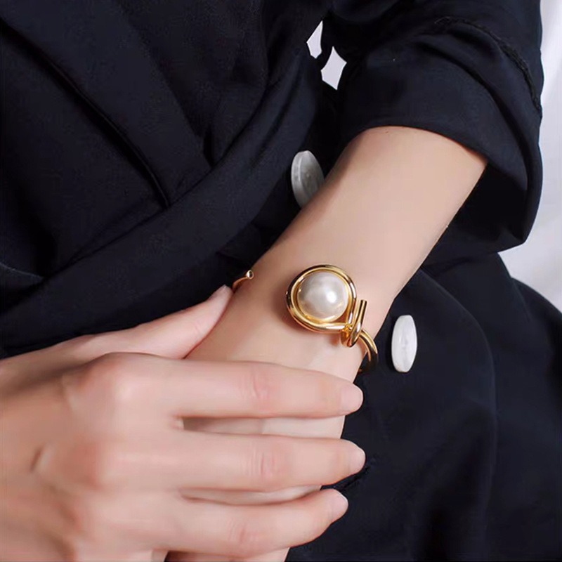 Chic & Sleek Openwork Bead Strap Wrist Ornament - Timeless Elegance