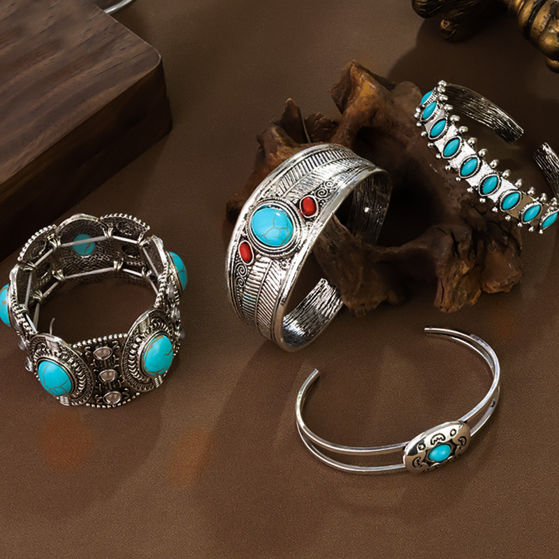 Artisan Tribal Cuff Bracelet Hand Stamped Turquoise Accent Bangle with Feather Motifs Adjustable Closure