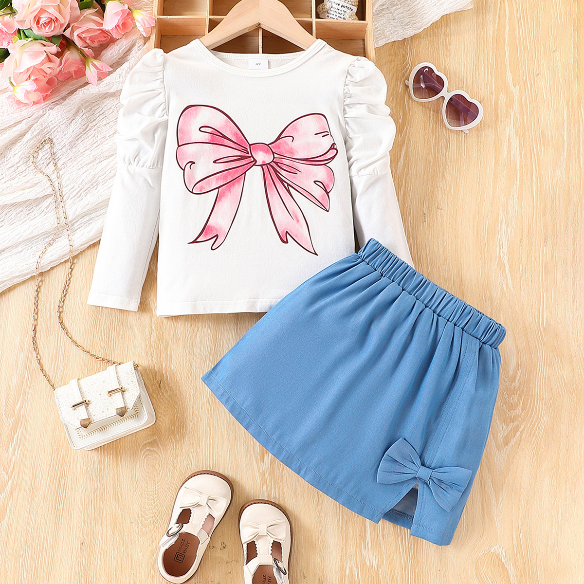 2-piece set of girls' fashionable casual bow print round neck pleated bubble long sleeved top and slit three-dimensional bow decoration short ski