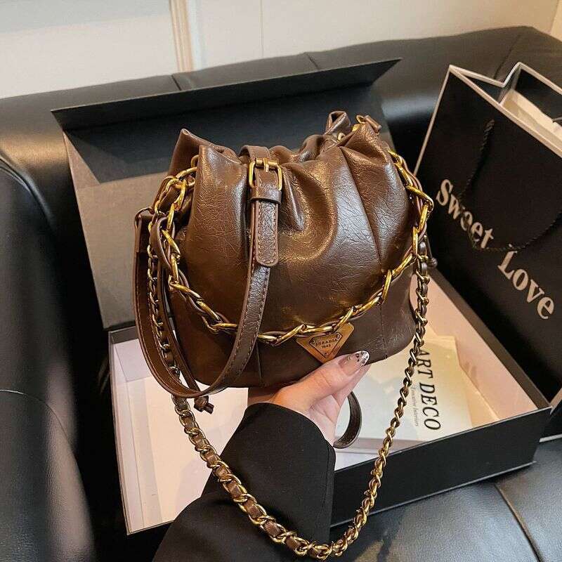 Soft leather pleated bucket bag, women's light bags with a stylish and niche high-end texture, chain shoulder