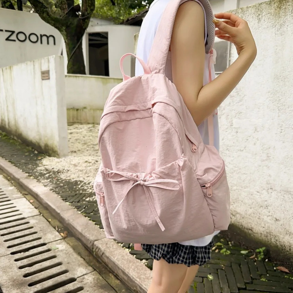 Student Backpack Womens Japanese Style Lightweight and Fashionable Backpack Solid Color Simple Bow Casual Travel Backpack250813