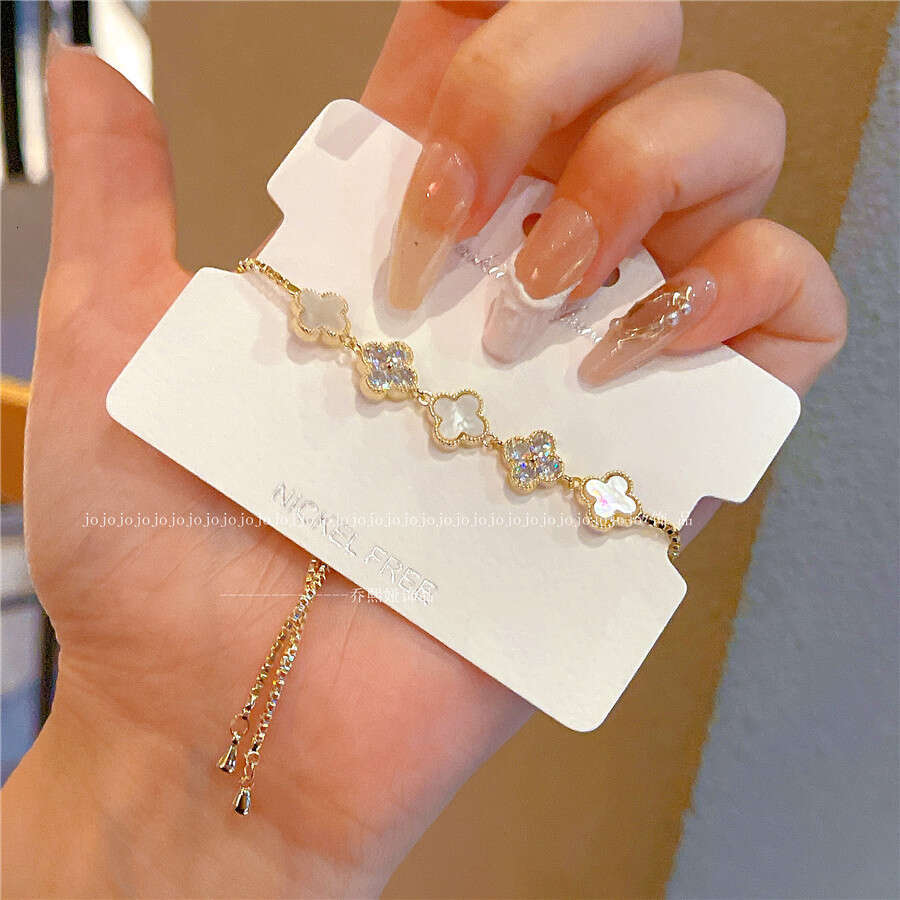 Luxury Jewelry Designer Bracelet for women 4-leaf clover bracelet INS Style Natural Shell Flower Bracelet New Girl's Sweet Design Sense Hand Rope