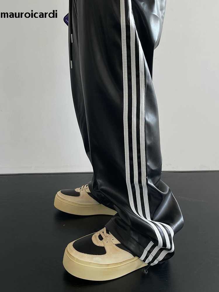 Mauroicardi Spring Autumn Cool Black Soft Stretchy Waterproof Pu Leather Pants for Men with Elastic Waist Loose Casual Clothes W250819