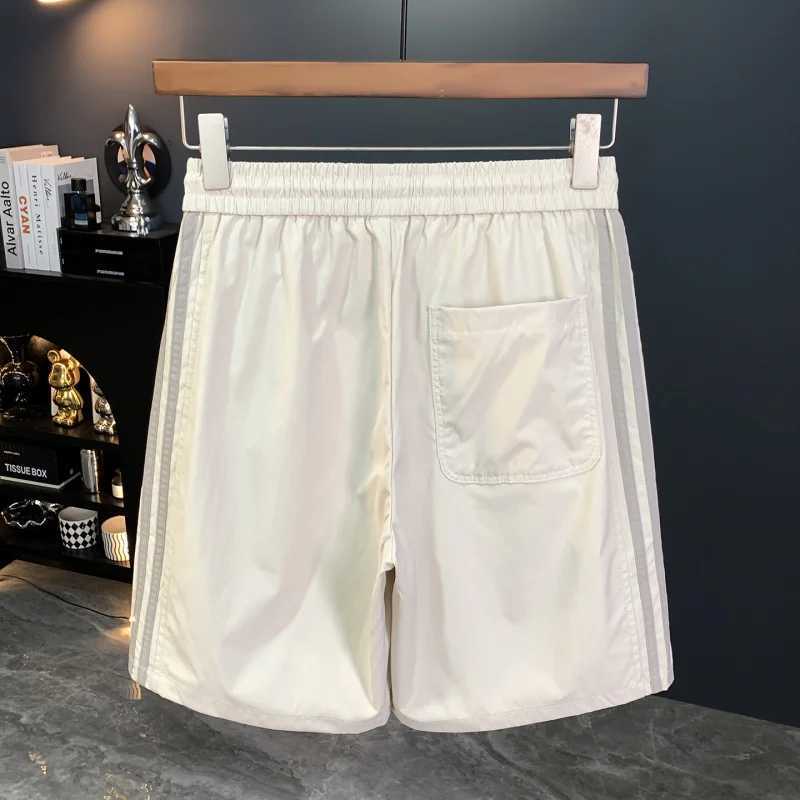 2025 new shorts for men in summer thin loose breathable elastic beach outdoor sports five-quarter pants W250819
