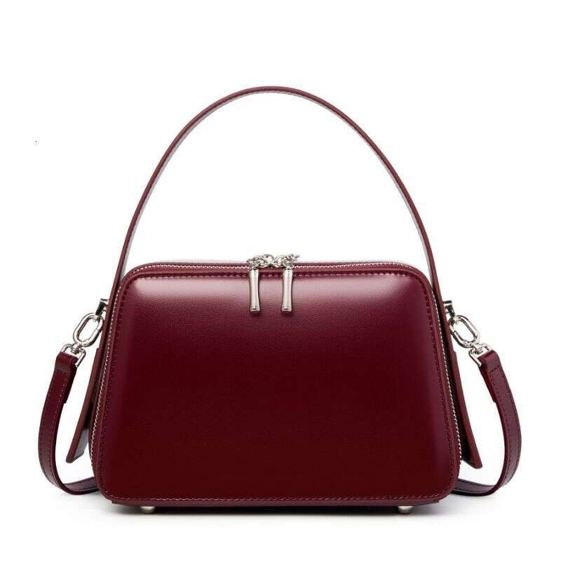 25 Spring Summer New Niche Design Ear-Hanging Series Handheld Brim Genuine Leather Women's Commuter Crossbody Bag