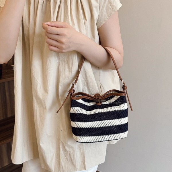 Free shipping designer 2025 New Style Hollow Out Tote Bag for Women Commuter Bag Single Shoulder Bag Black and White Striped Handbag