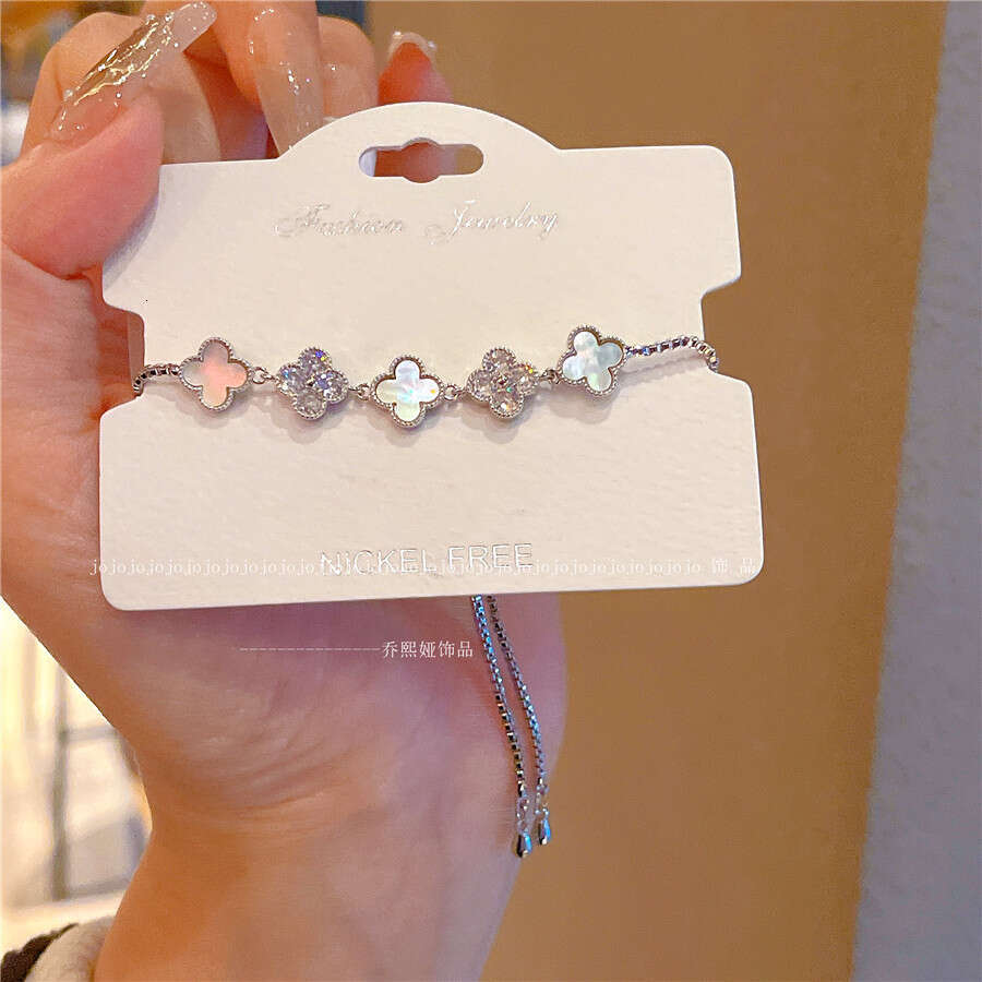 Luxury Jewelry Designer Bracelet for women 4-leaf clover bracelet INS Style Natural Shell Flower Bracelet New Girl's Sweet Design Sense Hand Rope