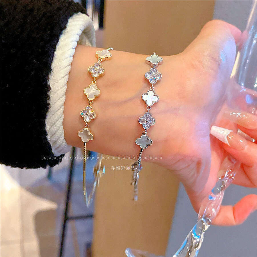 Luxury Jewelry Designer Bracelet for women 4-leaf clover bracelet INS Style Natural Shell Flower Bracelet New Girl's Sweet Design Sense Hand Rope