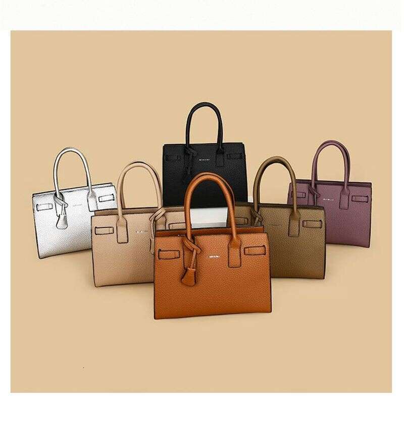 Large handheld commuter women's with a middle compartment, new style, large capacity, light texture bag