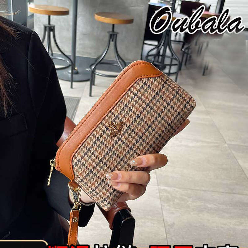 Handbag women's small bag holding 2023 new style can put mobile phone temperament exquisite high-end summer hand grasp coin purse