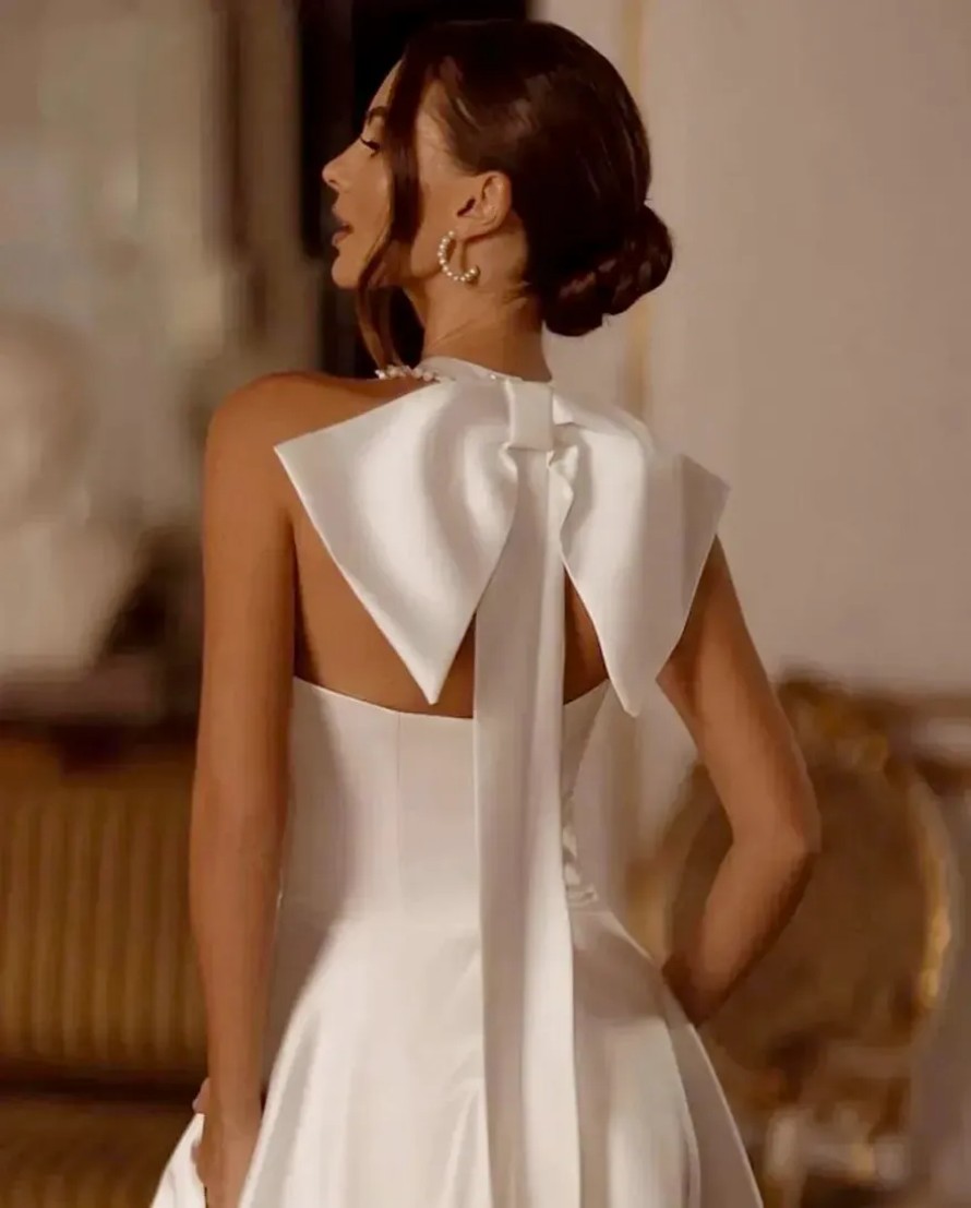 2025 A Line Satin Wedding Dresses Halter Neck Bow Sexy Pearls Side Split Bridal Gowns Custom Made Vestidos De Novia