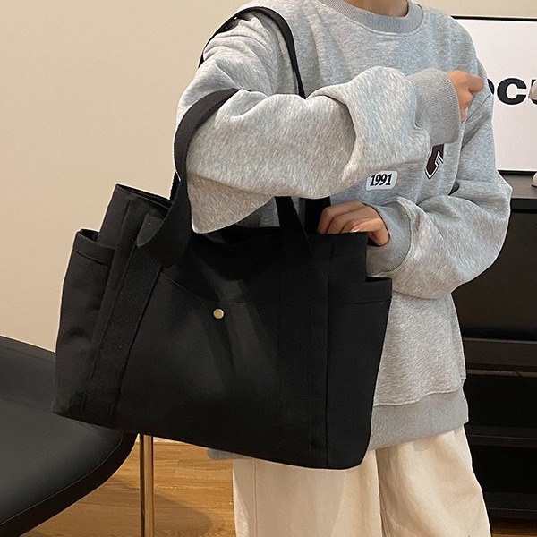 2025 Autumn Large Capacity Canvas Handbag Commuting Literature Student Backpack Women's Crossbody Bag Designer Bag Women's Shoulder Bag Dail