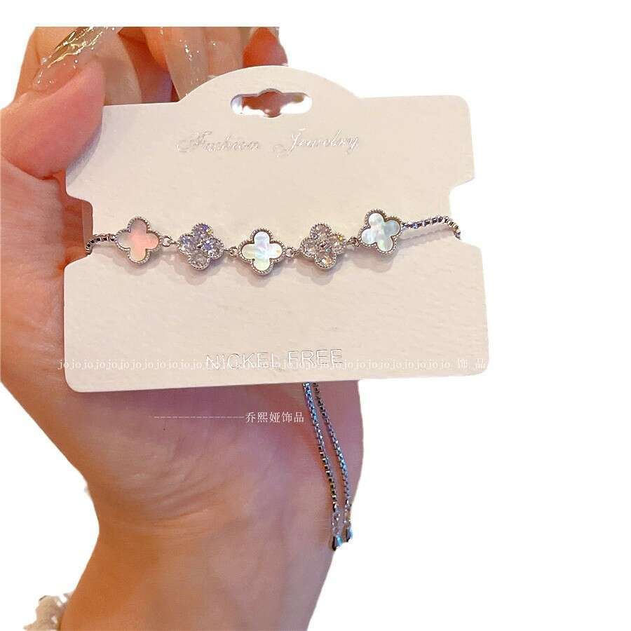 Luxury Jewelry Designer Bracelet for women 4-leaf clover bracelet INS Style Natural Shell Flower Bracelet New Girl's Sweet Design Sense Hand Rope