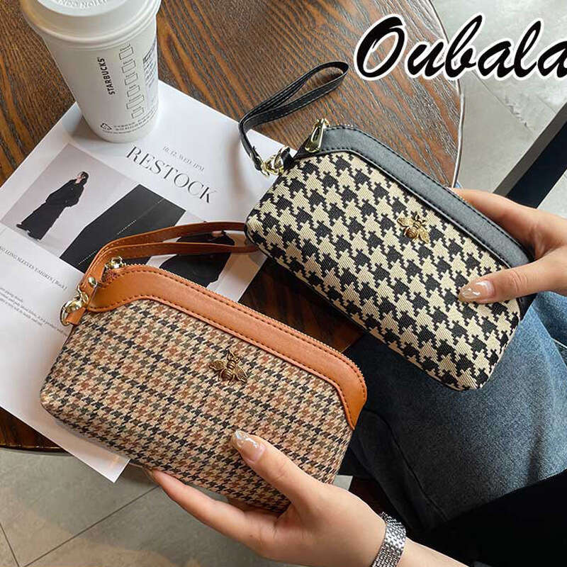 Handbag women's small bag holding 2023 new style can put mobile phone temperament exquisite high-end summer hand grasp coin purse
