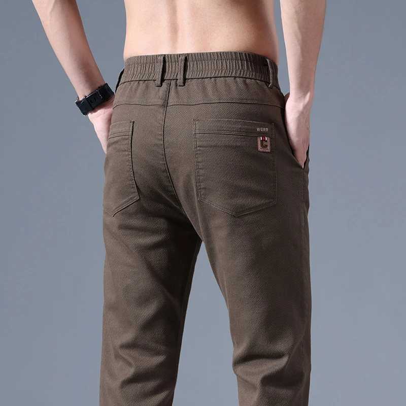 Mens Spring Autumn New Splicing Elasticized Button Zipper Pocket Fashion Solid Slim Straight Pants Korean Business Casual Pants W250819
