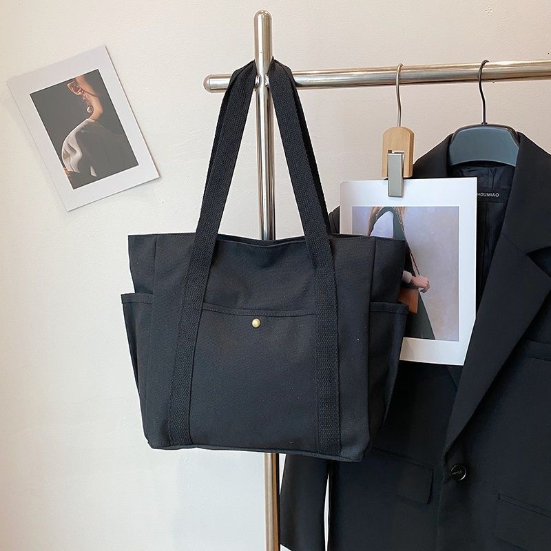 2025 Autumn Large Capacity Canvas Handbag Commuting Literature Student Backpack Women's Crossbody Bag Designer Bag Women's Shoulder Bag Dail