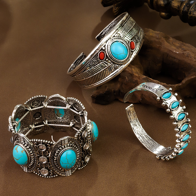 Artisan Tribal Cuff Bracelet Hand Stamped Turquoise Accent Bangle with Feather Motifs Adjustable Closure