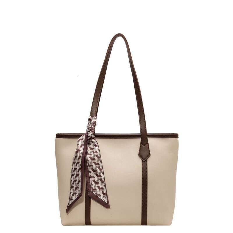 Korean version the tote sense of large capacity. The Maillard bag has a niche design that is simple and