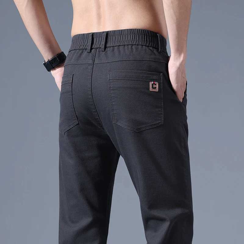 Mens Spring Autumn New Splicing Elasticized Button Zipper Pocket Fashion Solid Slim Straight Pants Korean Business Casual Pants W250819