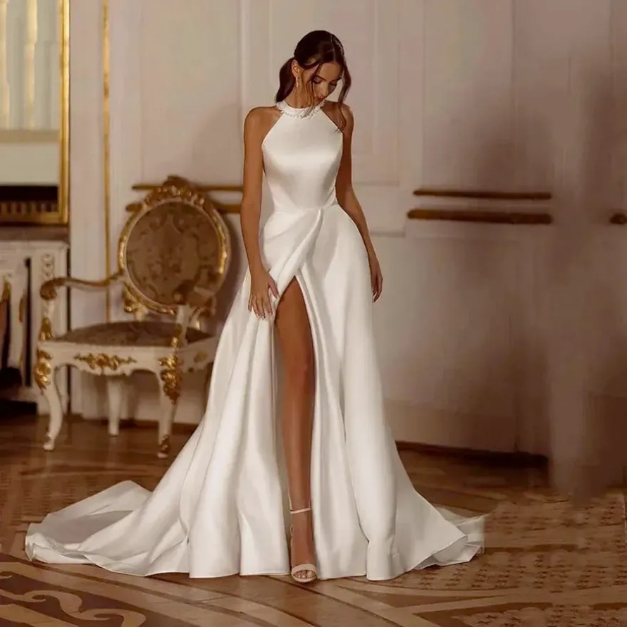 2025 A Line Satin Wedding Dresses Halter Neck Bow Sexy Pearls Side Split Bridal Gowns Custom Made Vestidos De Novia