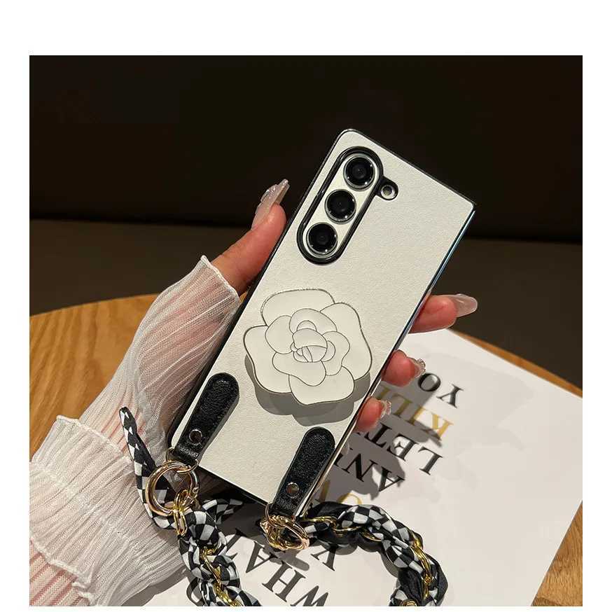 Phone case For Galaxy Z Fold 7 6 5 4 3 5G Lia Flower Stand Holder Bracelet Hand Chain Of Silk Scarf White Leather Case Cover