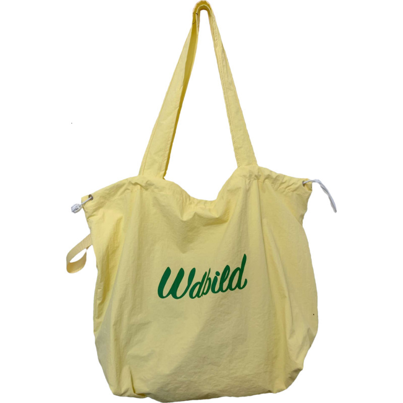 2025 Autumn Women's Casual Handbag Drawstring Canvas Bag Commuter Lightweight Handbag Large Capacity Shoulder Bag Women's Crossbody Bag Desi