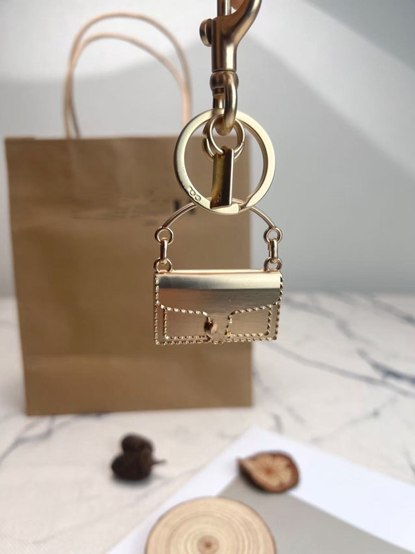 Top Luxury Tabby Keynchain pour femmes Cherry Sac Charm Co ch Brand Designer Key Ring Bag Bag Flower Letters Flower Car Keches Clèches de la chaî