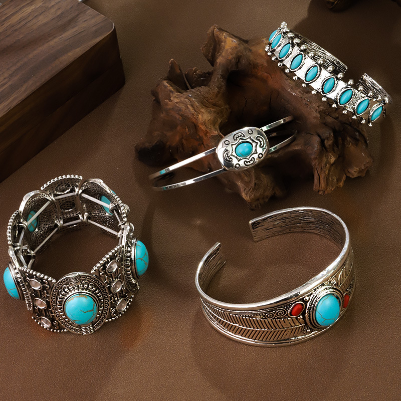 Artisan Tribal Cuff Bracelet Hand Stamped Turquoise Accent Bangle with Feather Motifs Adjustable Closure