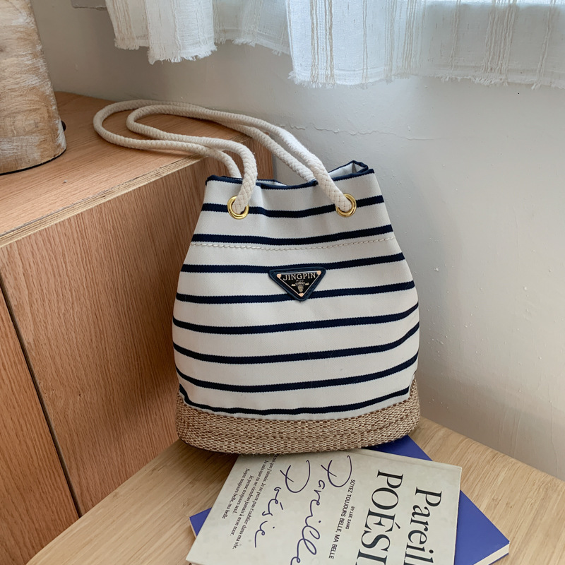 Free shipping designer Korean Style Striped Bucket Bag Women Bag 2025 New Summer Fashion Casual Shoulder Bag Commuter Bag Crossbody Bag
