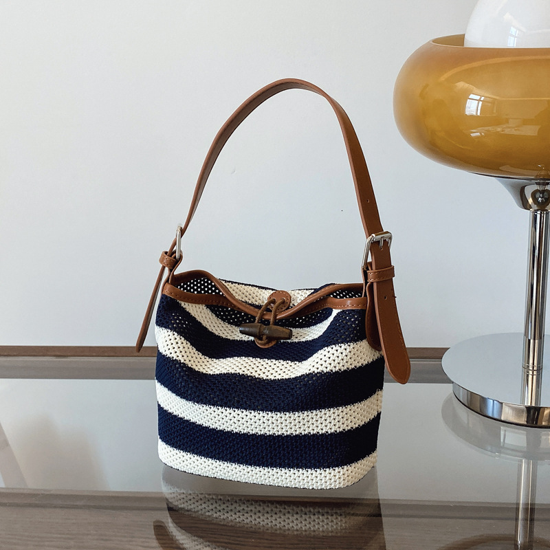 Free shipping designer 2025 New Style Hollow Out Tote Bag for Women Commuter Bag Single Shoulder Bag Black and White Striped Handbag