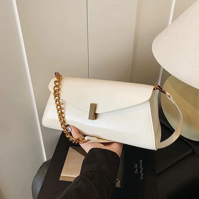 Free shipping designer 2025 New Retro Design Fashion Baguette Single Shoulder Bag Crossbody Bag Chain Commuter Bag Underarm Bag