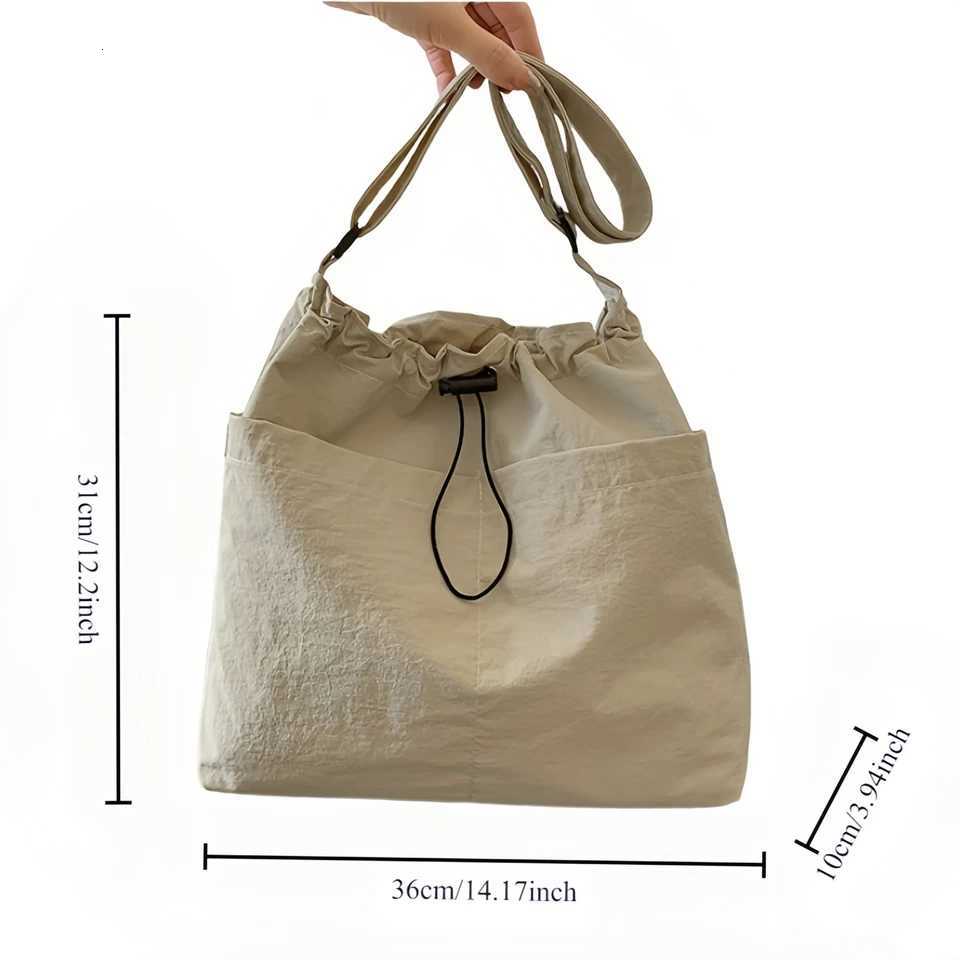 Womens bucket bag with top drawstring closure - Spacious nylon textured tote bag for casual outings and travel essentials-tan Y250819