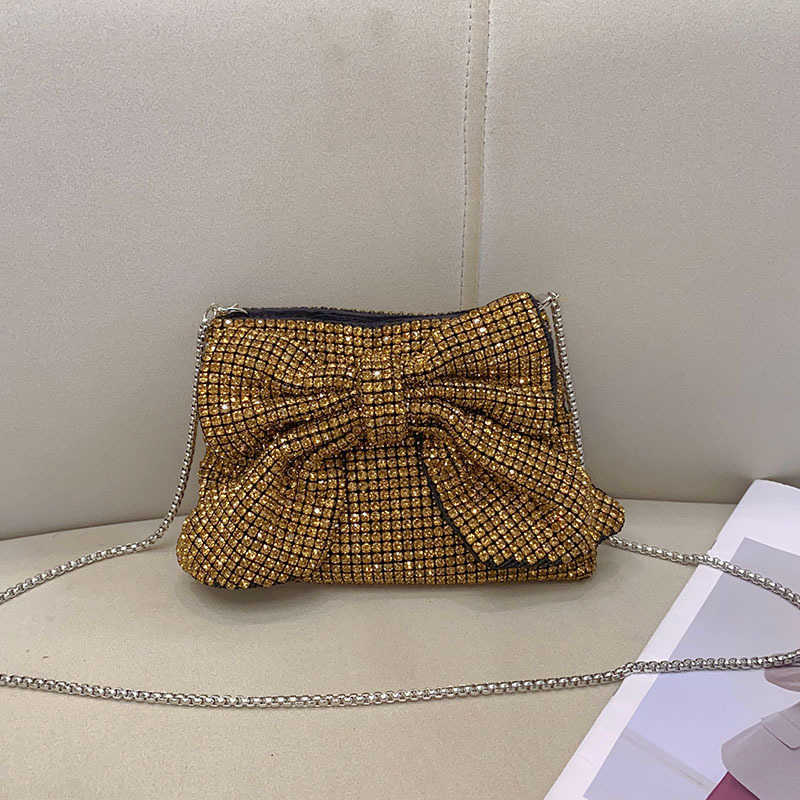 Fashionable, shiny, non functional, rhinestone, big bow, elegant and luxurious, ladies and socialites, evening party, hand-held crossbody bag